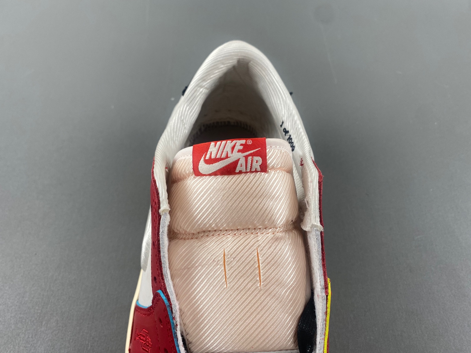 trophy room x air jordan 1 low og "home" hv6157-100